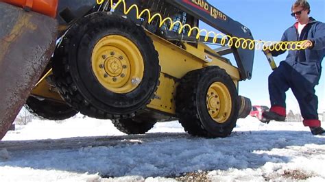 Rebeading skid loader tire with starter fluid 